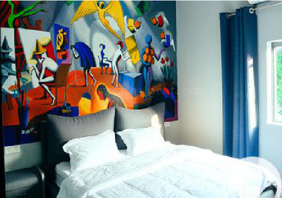 修文对于酒店的墙体彩绘而言更注重哪些方面？